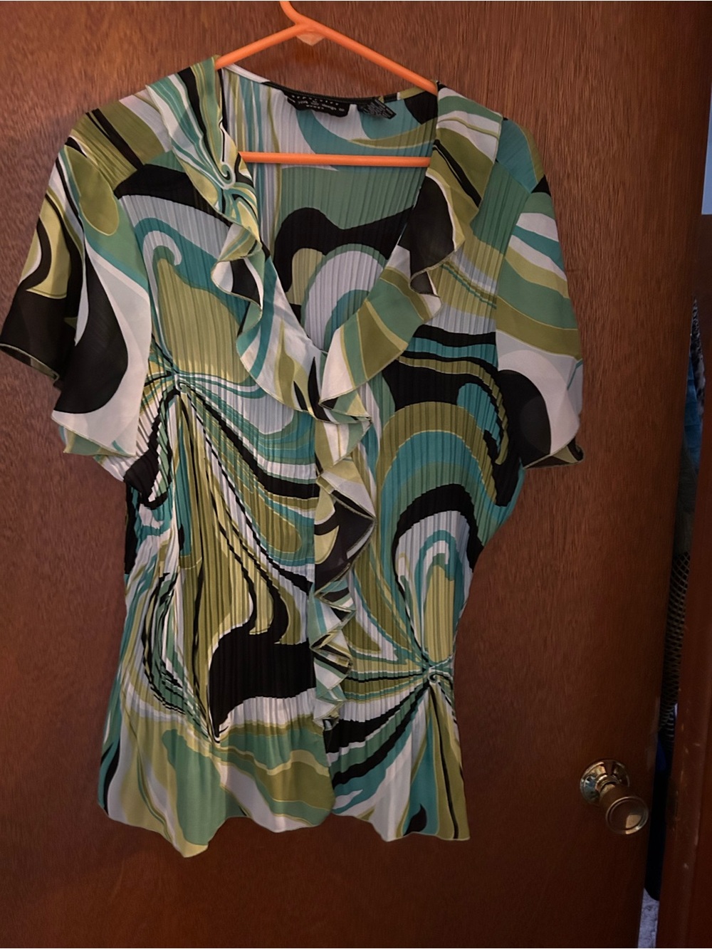 Abstract Ruffled V-Neck Blouse in Green Swirl